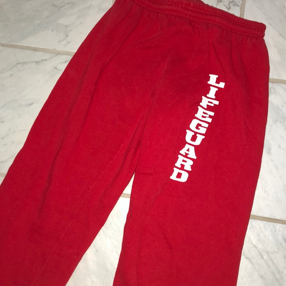 Red lifeguard style sweatpants